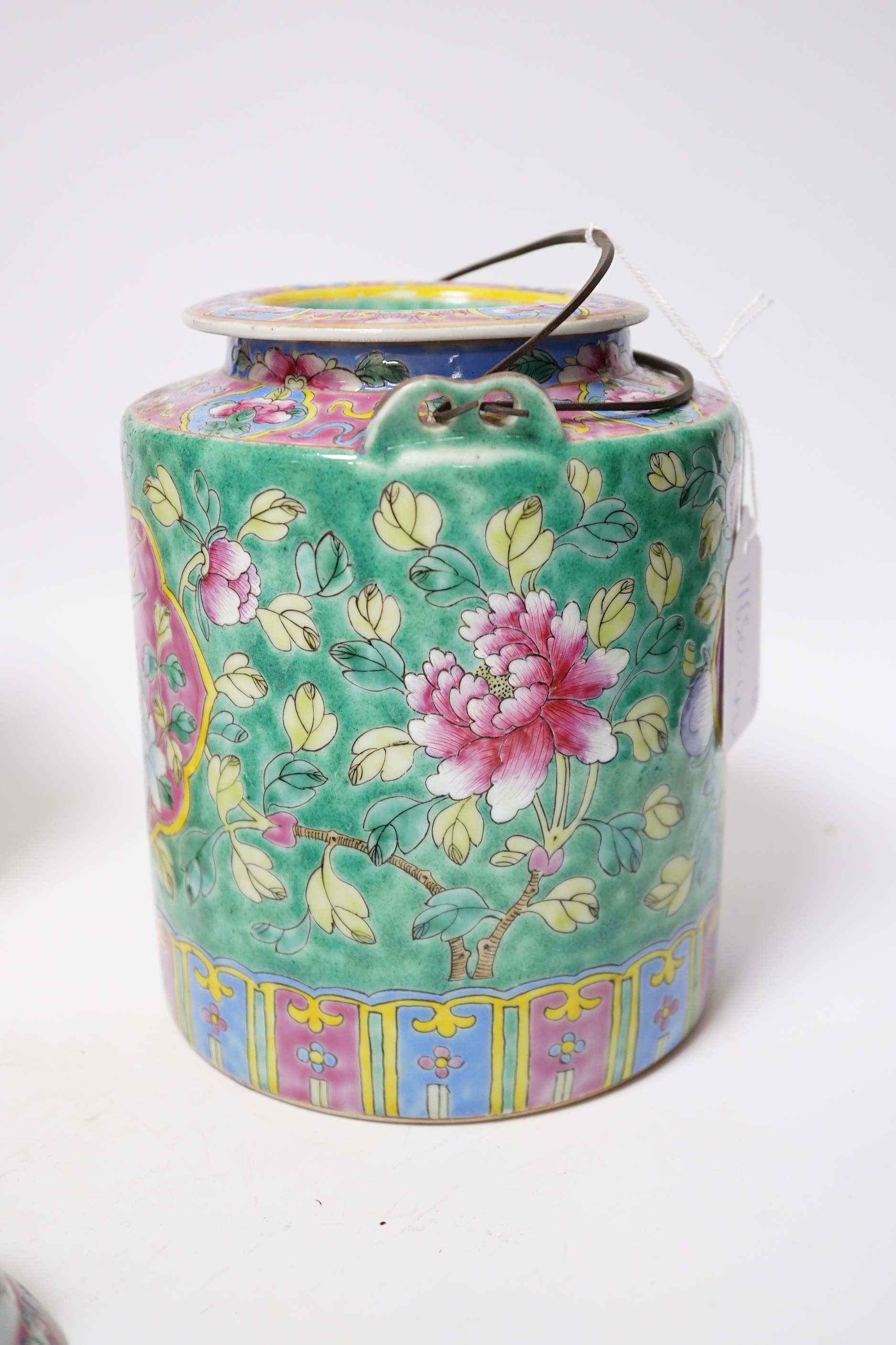 A Chinese Straits enamelled porcelain teapot and cover and seven similar tea bowls, Guangxu period and a pillow, teapot 18cm high including cover
